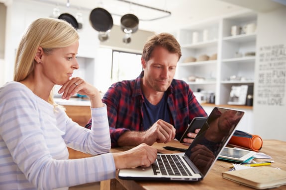 couple looking at finances