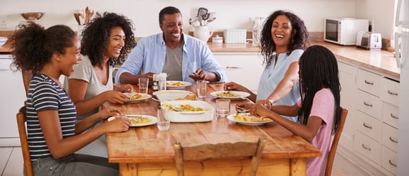FAMILY AROUND TABLE
